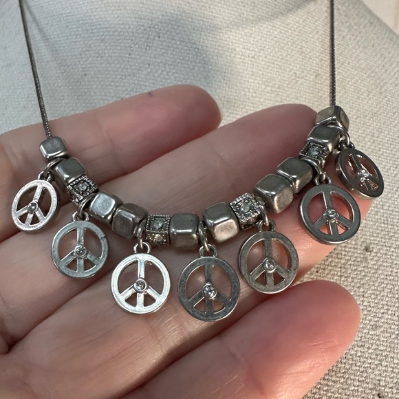 Silvertone multi peace sign charm style dangle necklace - Picture 2 of 5